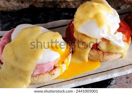 Close-Up 4K Ultra HD Image of Eggs Benedict with Hollandaise Sauce - Stock Photography