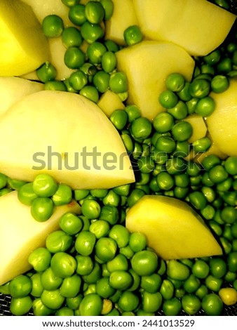 This is a picture of potatoes and peas 
