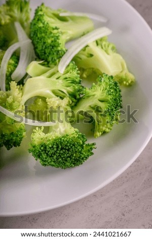 Close-Up 4K Ultra HD Image of Steam Cooked Broccoli on Plate - Stock Photography