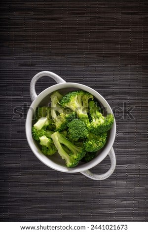 Close-Up 4K Ultra HD Image of Steam Cooked Broccoli in Pan - Stock Photography