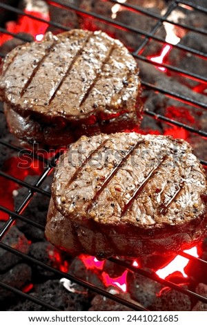 Close-Up 4K Ultra HD Image of Sirloin Steak on BBQ Grill - Stock Photography