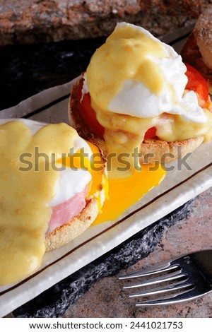 Close-Up 4K Ultra HD Image of Eggs Benedict with Hollandaise Sauce - Stock Photography