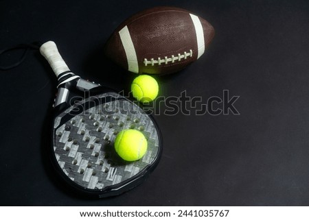Sports equipment, rackets and balls on black background. Horizontal education and sport poster, greeting cards, headers, website