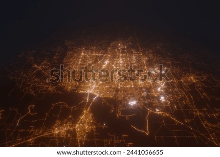 Aerial view on Memphis (USA) from west. Top view on modern city at night from space