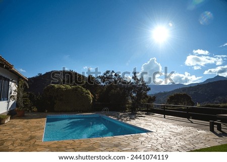 A Swimming Pool outside a Beautiful Country House on a Summer Day - Itaipava, Rio de Janeiro, Brazil