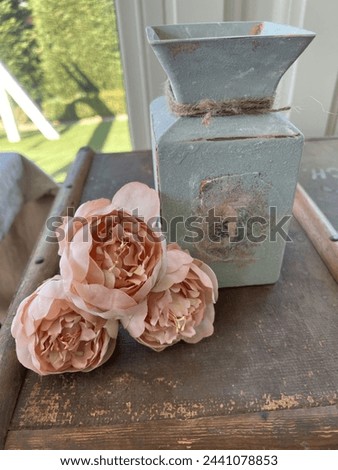 Painted square vase on trunk with peonies and paper detail