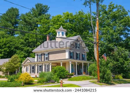 Historic residential house on Main Street in historic town center of Newfields, New Hampshire NH, USA.  Royalty-Free Stock Photo #2441084215