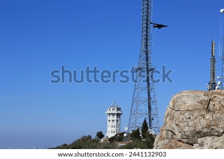 Distant view of Büyükada Fire Watchtower Royalty-Free Stock Photo #2441132903