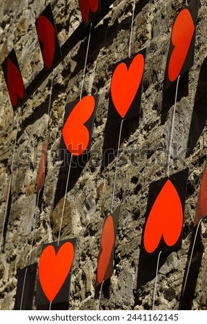 Close up of hanging hearts on a wall