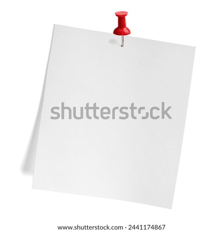 close up of  a note paper with a red push pin on white background