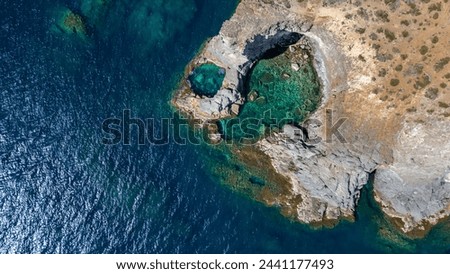 Wonderful view from above of the coast of Sardinia. "Cala della Signora" on a sunny summer day