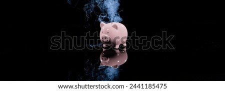 Pink Piggy Bank Burning Against Black Background in 4K Ultra HD Resolution - Stock Footage
