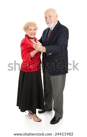 Beautiful senior couple dancing together.  Full body isolated on white.