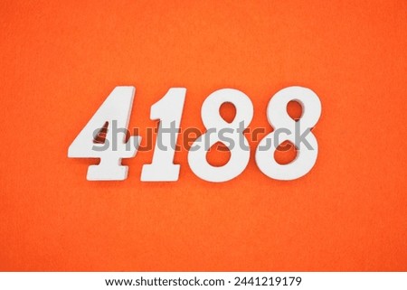 Orange felt is the background. The numbers 4188 are made from white painted wood.