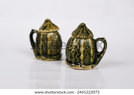 unique ceramic cup in the shape of bitter melon