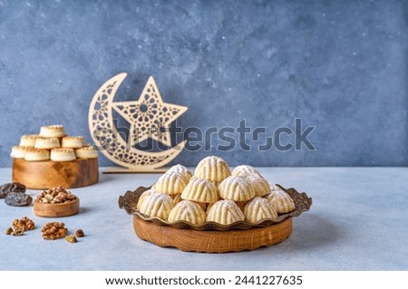 Assorted semolina maamoul or mamoul cookies with ramadan decor. Traditional arabic Eid al Adha, Eid al Fitr sweets