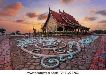 Ubon Ratchathani,Amazing Temple Sirindhorn Wararam Phuproud in Ubon Ratchathani Province at twilight time,Thailand.Thai temple with grain and select white balance 
