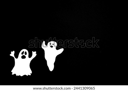 happy halloween - ghosts on the black background - spooky