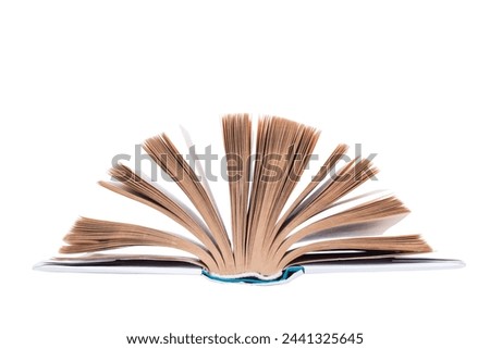 open book. Composition with hardcover books, fanned pages, isolated on white background. Back to school. Copy Space. Education background
