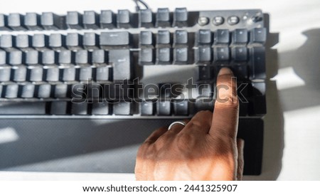 Data input device Computer keyboard used in detail Royalty-Free Stock Photo #2441325907