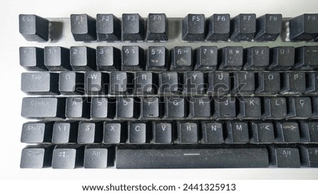 Data input device Computer keyboard used in detail Royalty-Free Stock Photo #2441325913