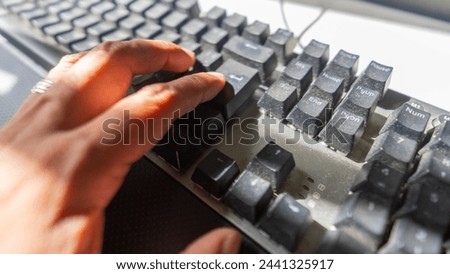 Data input device Computer keyboard used in detail Royalty-Free Stock Photo #2441325917