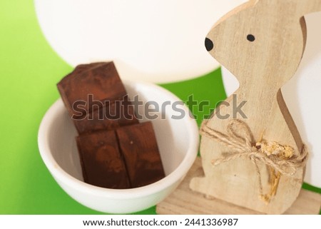 easter bunny with bowl of chocolate
