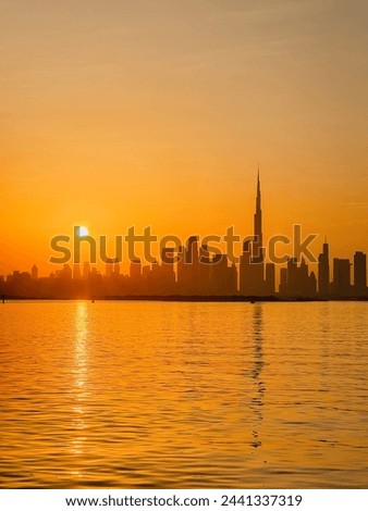 amazing sunset view of Dubai Downtown cityline from Dubai Creek harbour Royalty-Free Stock Photo #2441337319