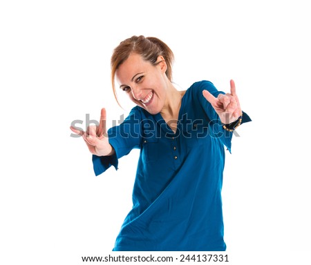 Woman making horn gesture 