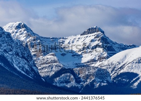 Closeup of snowcapped Mount Whyte and Mount Niblock in the Winter at Lake Louise in Banff National Park, Alberta, Canada. Royalty-Free Stock Photo #2441376545