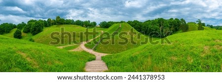 Panorama view of the Hillforts of Kernave, ancient capital of Grand Duchy of Lithuania. Royalty-Free Stock Photo #2441378953