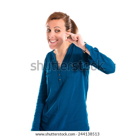 Woman doing tiny sign 