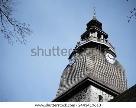 The beautiful white stone church is a capturing sight in the skyline of Naantali. The church was built between the 1460s and 80s as a church for a Catholic St. Bridget’s convent. Royalty-Free Stock Photo #2441419613