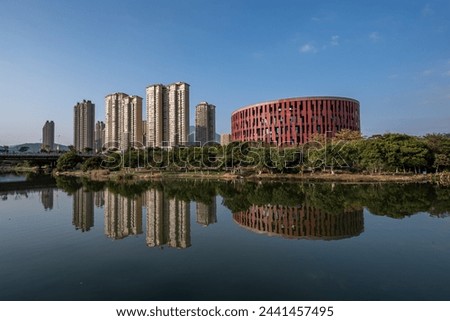 The stream reflects the Putian Museum of China in the evening Royalty-Free Stock Photo #2441457495