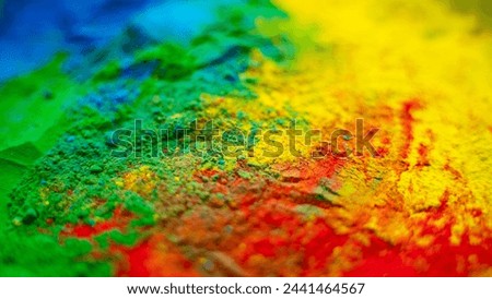 Holi colorful background, close-up shot of Powder Color or Gulal Royalty-Free Stock Photo #2441464567