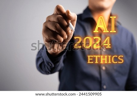 A man is drawing a picture of a hand with a marker on a white background. The word "AI 2024 Ethics" is written in orange letters above the drawing