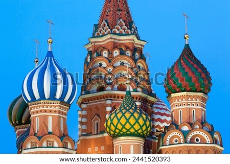 Onion domes of St. Basil's Cathedral in Red Square illuminated in the evening, UNESCO World Heritage Site, Moscow, Russia, Europe