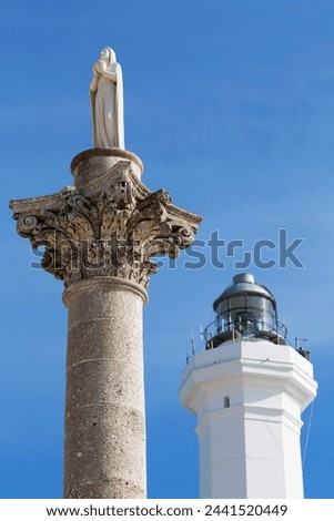 Statue and lighthouse at Santa Maria di Leuca, Leuca, Puglia, Italy, Europe Royalty-Free Stock Photo #2441520449