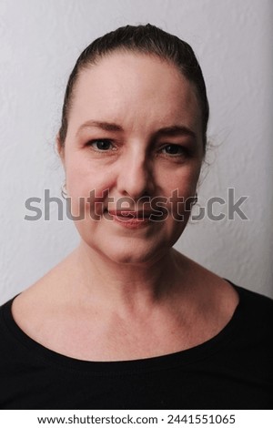 Serene Mature Woman with a Gentle Smile