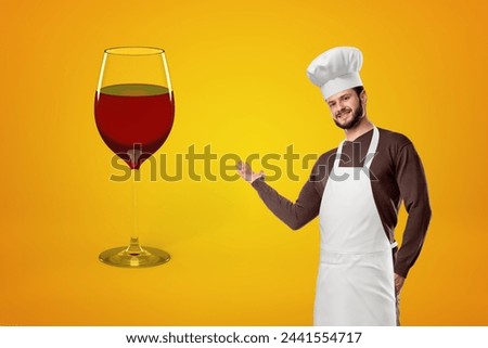 Chef presenting a giant wine glass
