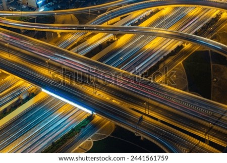 A picture of the busy Al Safa Street and Sheikh Zayed road intersection at night.