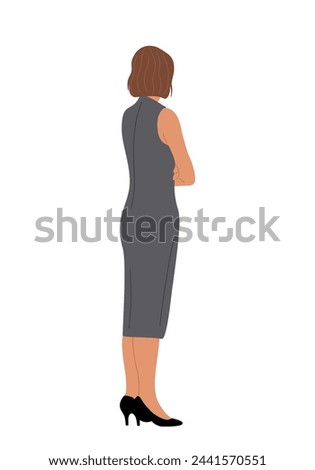 Business woman standing full length rear view.  Royalty-Free Stock Photo #2441570551