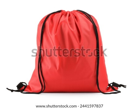 One red drawstring bag isolated on white Royalty-Free Stock Photo #2441597837
