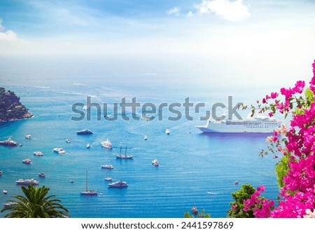 colorful coast and blue water with boats and ships, cote dAzur Provence, France, at summer Royalty-Free Stock Photo #2441597869