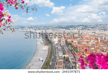 cityscape of Nice with beach, blue sky and sea, cote dAzur, France Royalty-Free Stock Photo #2441597871