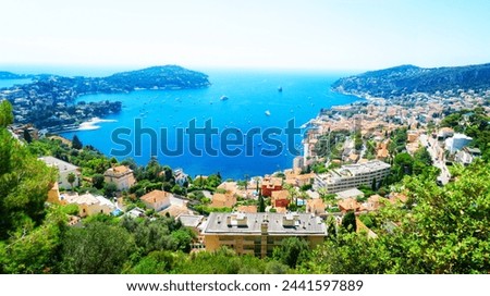 colorful coast and turquiose water with houses and ships, panorama of cote dAzur Provence, France Royalty-Free Stock Photo #2441597889