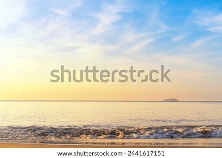 Waves and the beach in the evening