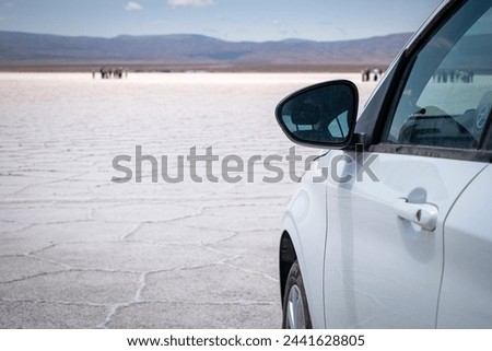 Car parked in the enormous Salar de Jujuy, Argentina. Car parked in Salinas Grandes, Jujuy, Argentina. Salinas Grandes, Jujuy, Argentina.  Huge Argentine salt flat. Royalty-Free Stock Photo #2441628805