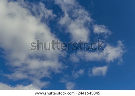 Ornamental clouds. Dramatic sky. Epic storm cloudscape Soft sunlight. Panoramic image texture background graphic resources design Meteorology, heaven hope peace concept.