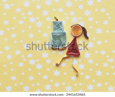 quilling card with stick figure girl giving a cake. Happy birthday. greeting cards. Hand made of paper quilling technique. Handicraft at home. Hobby, home office.